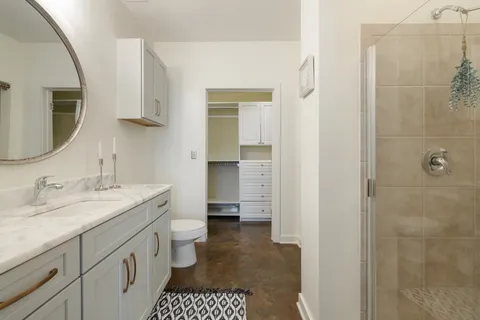 a room with a bed and a window