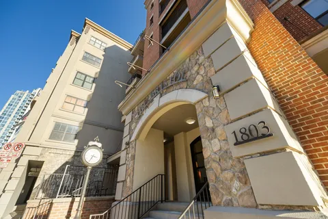 a living room with furniture fireplace and a flat screen tv