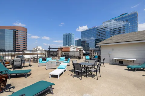 a view of a patio with swimming pool