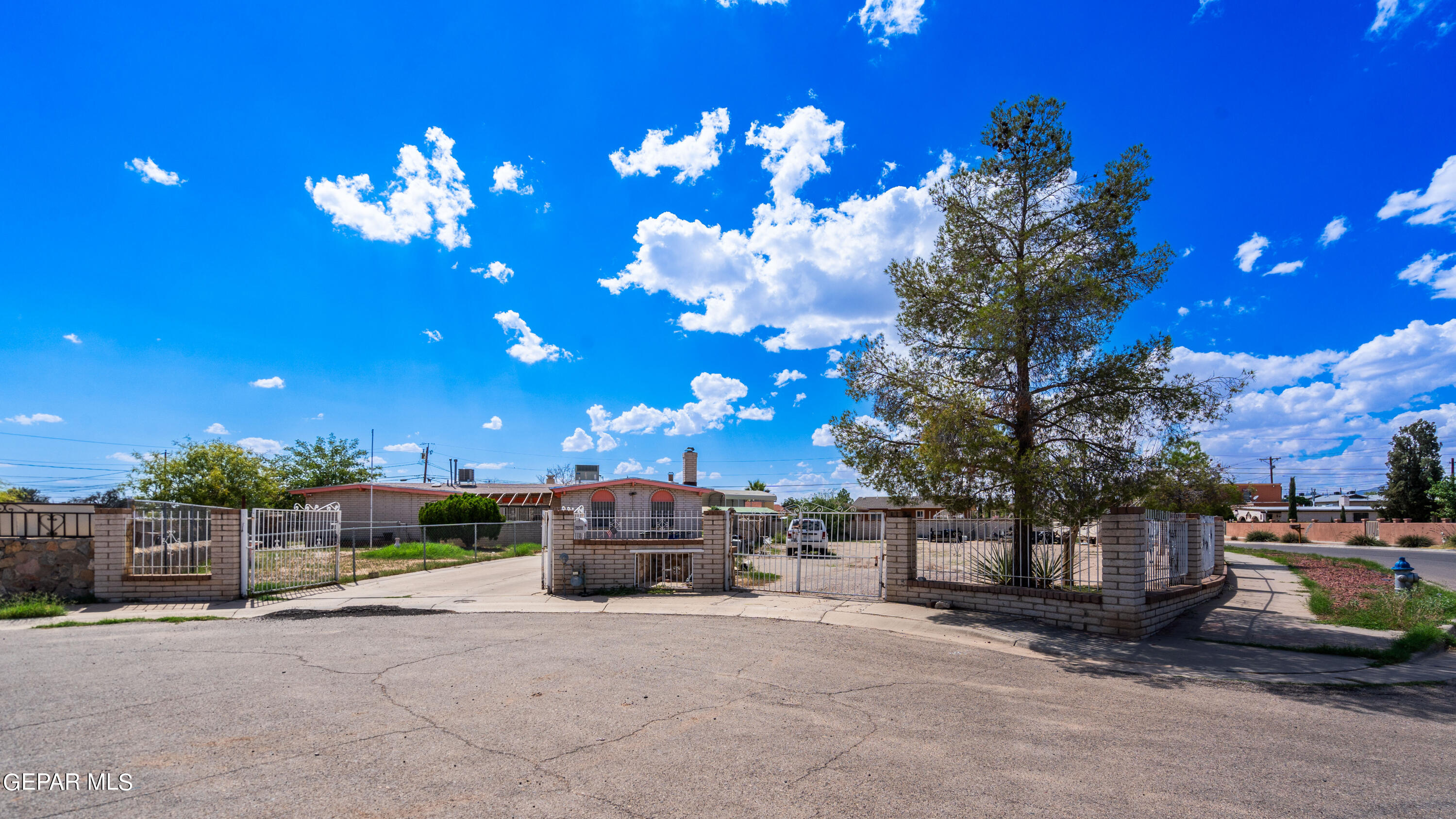 7828 Caliche Drive El Paso, TX 79915 - Photo 3 of 34 a view of a house with a street