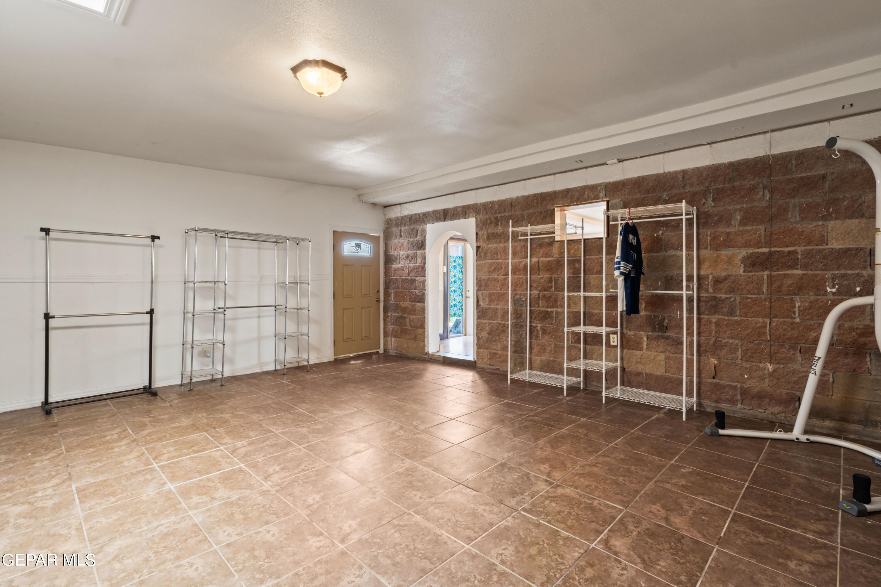 7828 Caliche Drive El Paso, TX 79915 - Photo 32 of 34 a view of a livingroom with walk in closet and bedroom