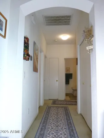 a bathroom with a shower and a toilet