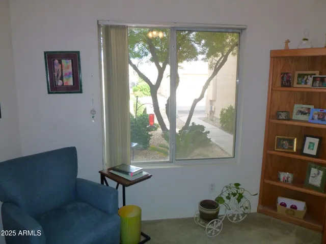 a room with furniture and a window