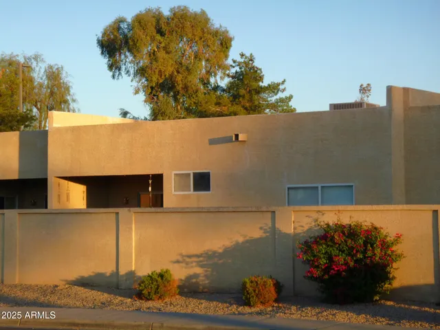 aerial view of a house with a yard
