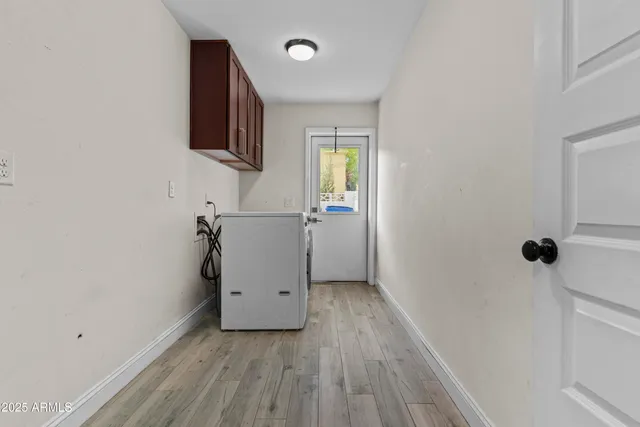 a bathroom with a granite countertop sink a toilet and a shower