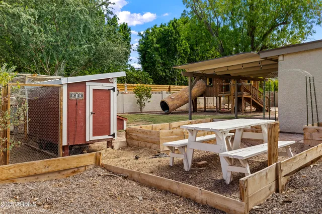 an outdoor view of house with outdoor seating