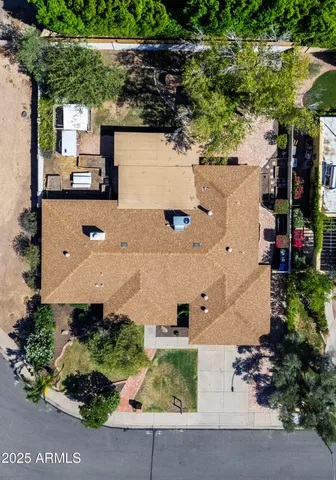 a view of yellow house with a outdoor space