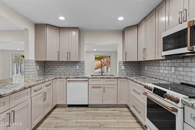 a view of kitchen and windows