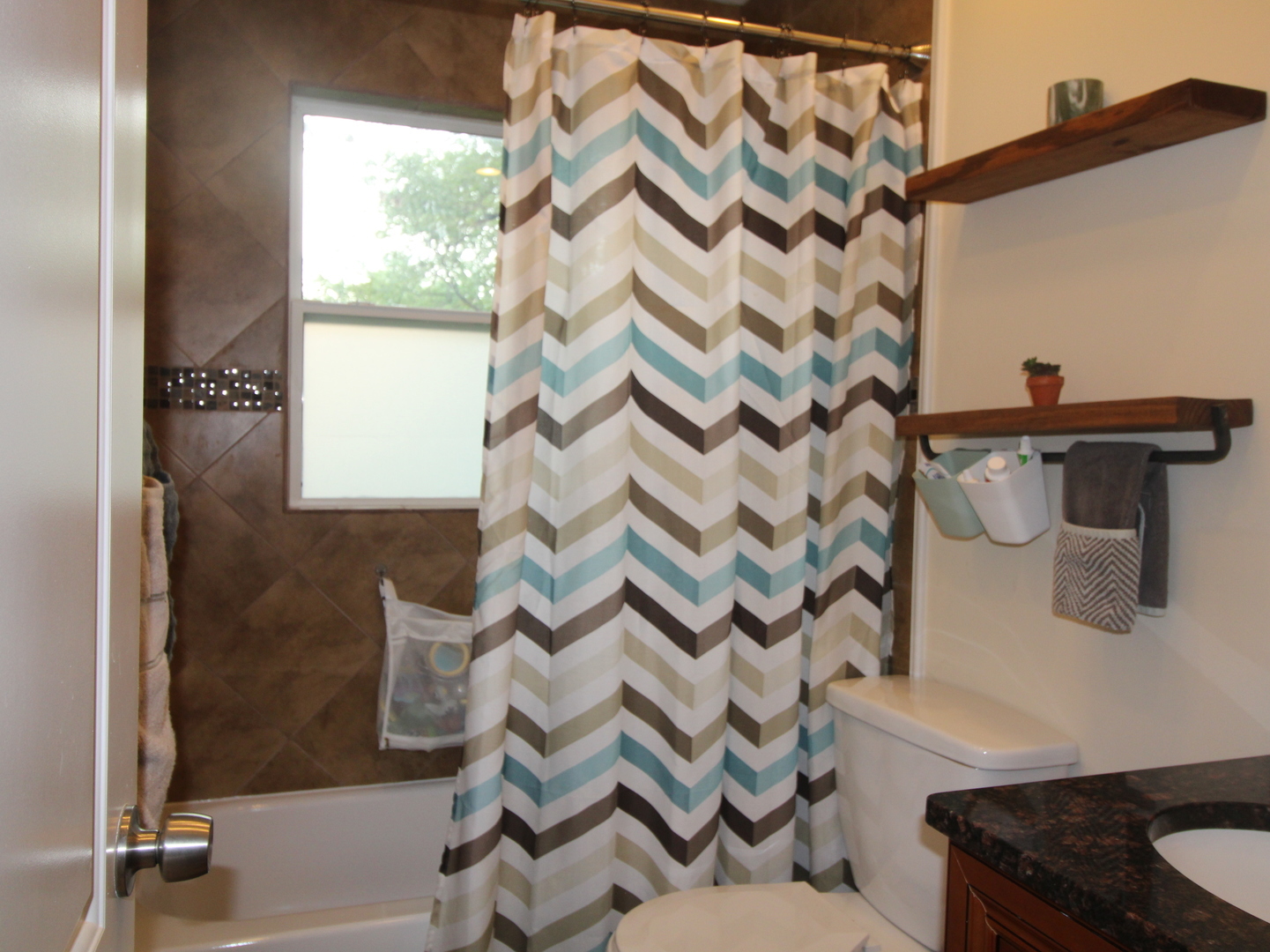 552 Spruce Road Bolingbrook, IL 60440 - Photo 14 of 18 a bathroom with a sink and a mirror
