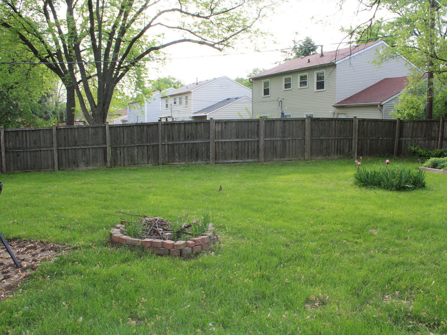 552 Spruce Road Bolingbrook, IL 60440 - Photo 16 of 18 a view of a backyard with a trampoline