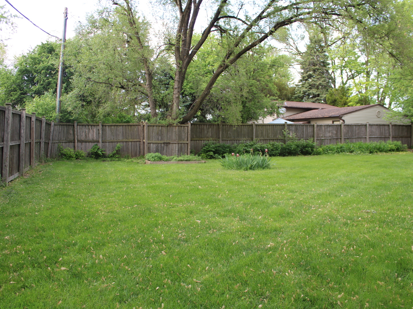 552 Spruce Road Bolingbrook, IL 60440 - Photo 18 of 18 a view of a backyard with a swing
