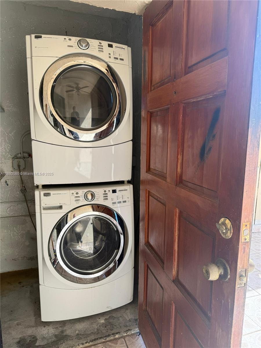 5530 West 26th Court, Unit 104 Hialeah, FL 33016 - Photo 13 of 14 a utility room with dryer and washer