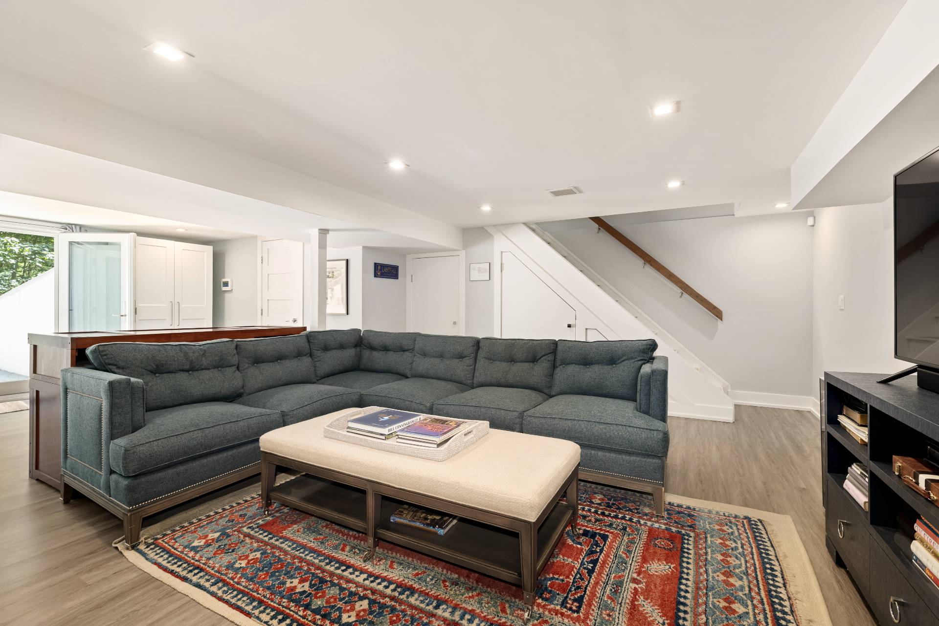 27 Landfall Road East Hampton, NY 11937 - Photo 15 of 24 a living room with furniture and a rug