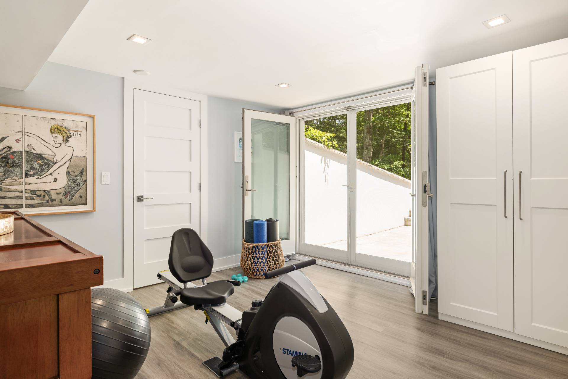 27 Landfall Road East Hampton, NY 11937 - Photo 16 of 24 a view of a workspace with furniture and a window