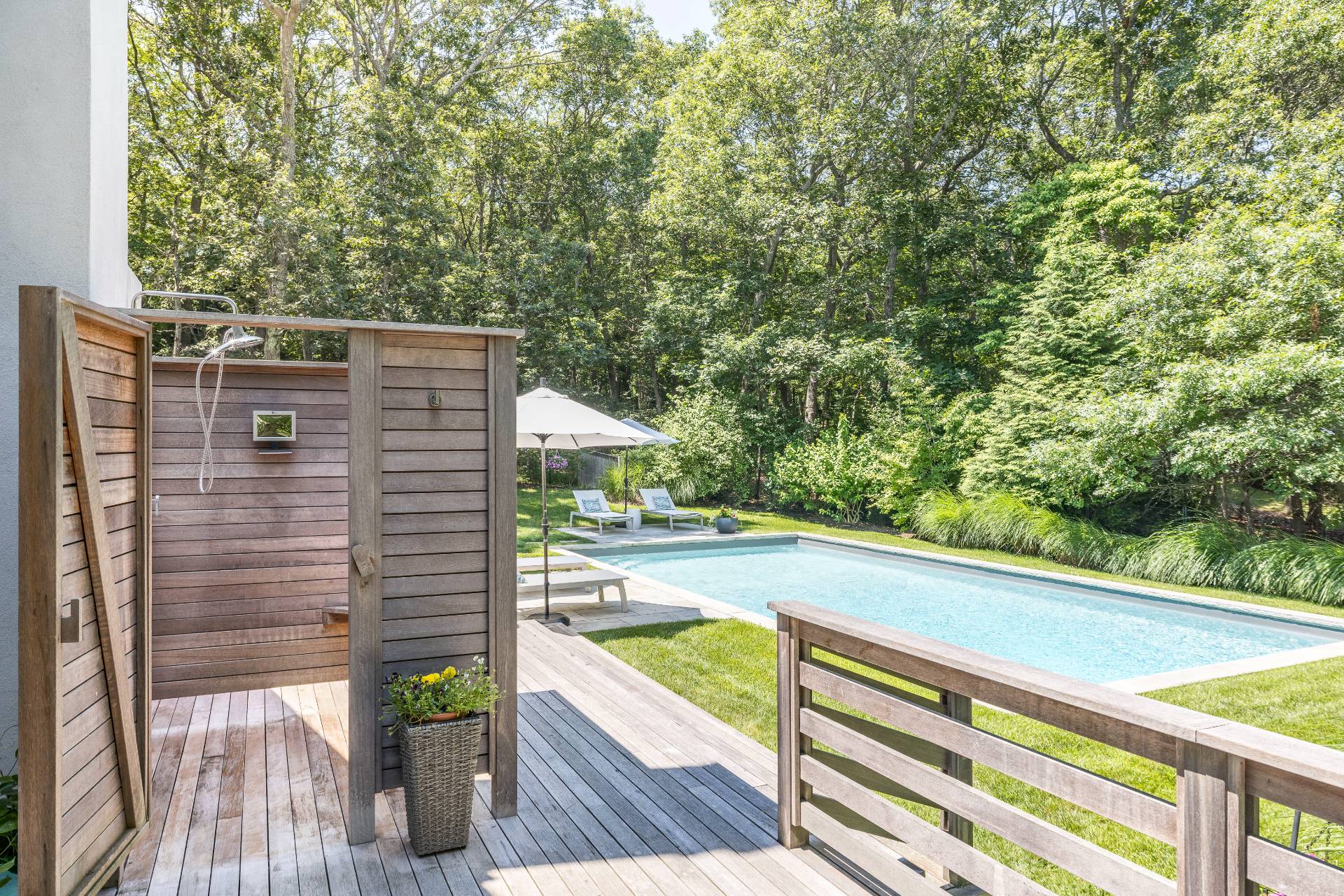 27 Landfall Road East Hampton, NY 11937 - Photo 22 of 24 a view of balcony with two chairs and a table