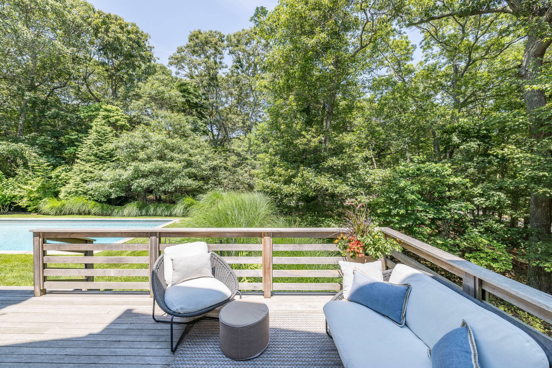 27 Landfall Road East Hampton, NY 11937 - Photo 23 of 24 a view of roof deck with lawn chairs and wooden fence