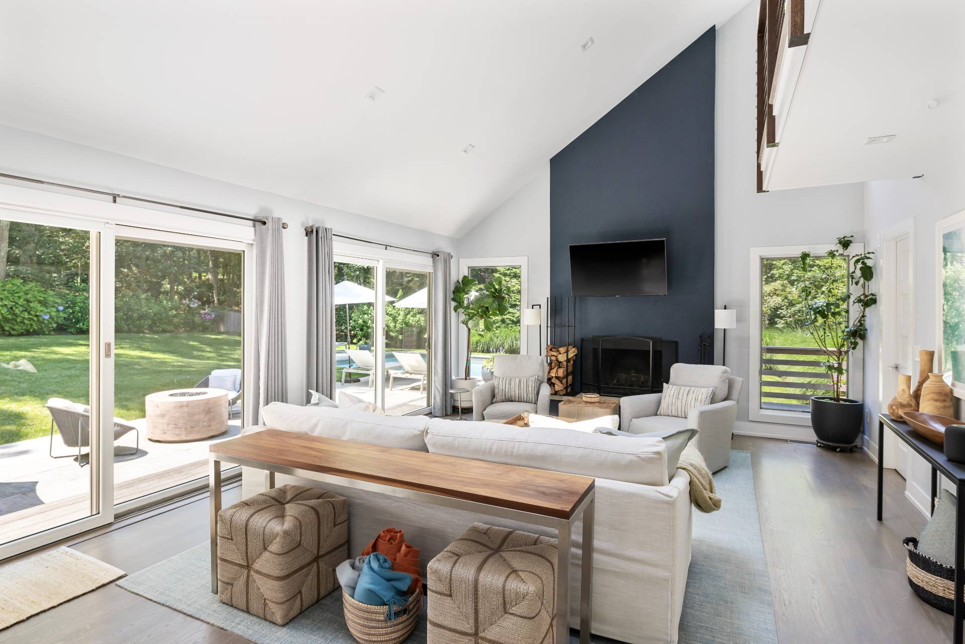 27 Landfall Road East Hampton, NY 11937 - Photo 4 of 24 a living room with furniture and a large window