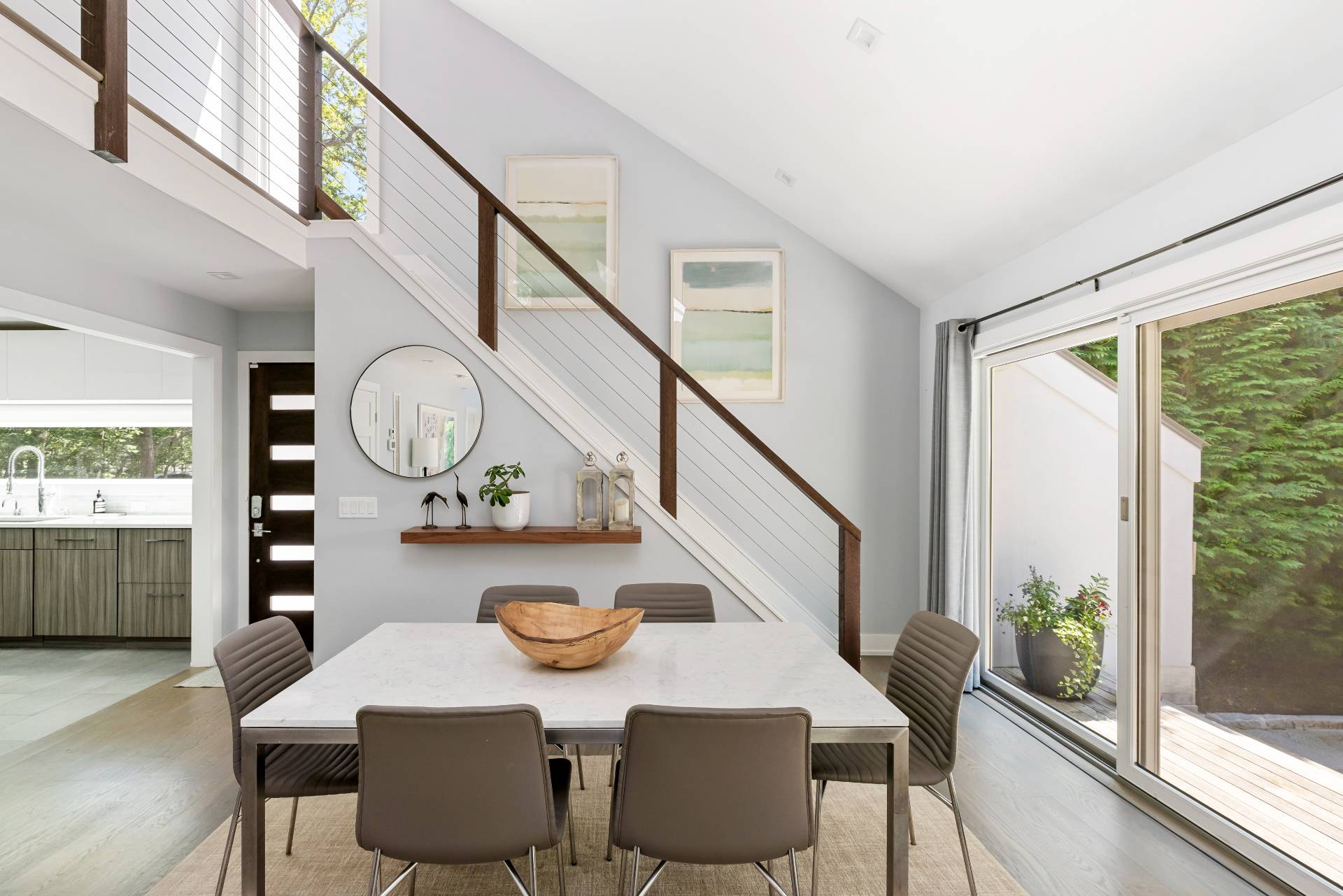 27 Landfall Road East Hampton, NY 11937 - Photo 7 of 24 a view of a dining room with furniture window and wooden floor