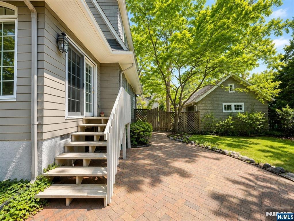 84 Valley View Avenue Ridgewood, NJ 07450 - Photo 18 of 20 a house view with a garden space