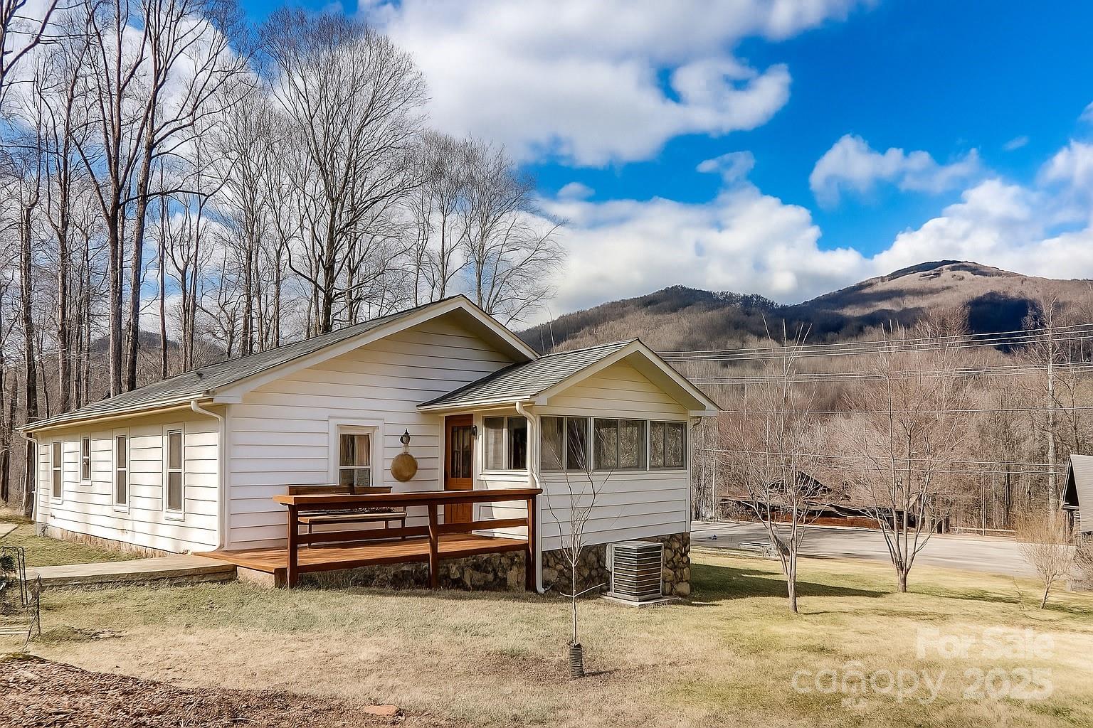 1639 Soco Road Maggie Valley, NC 28751 - Photo 15 of 15 a house view with a garden space