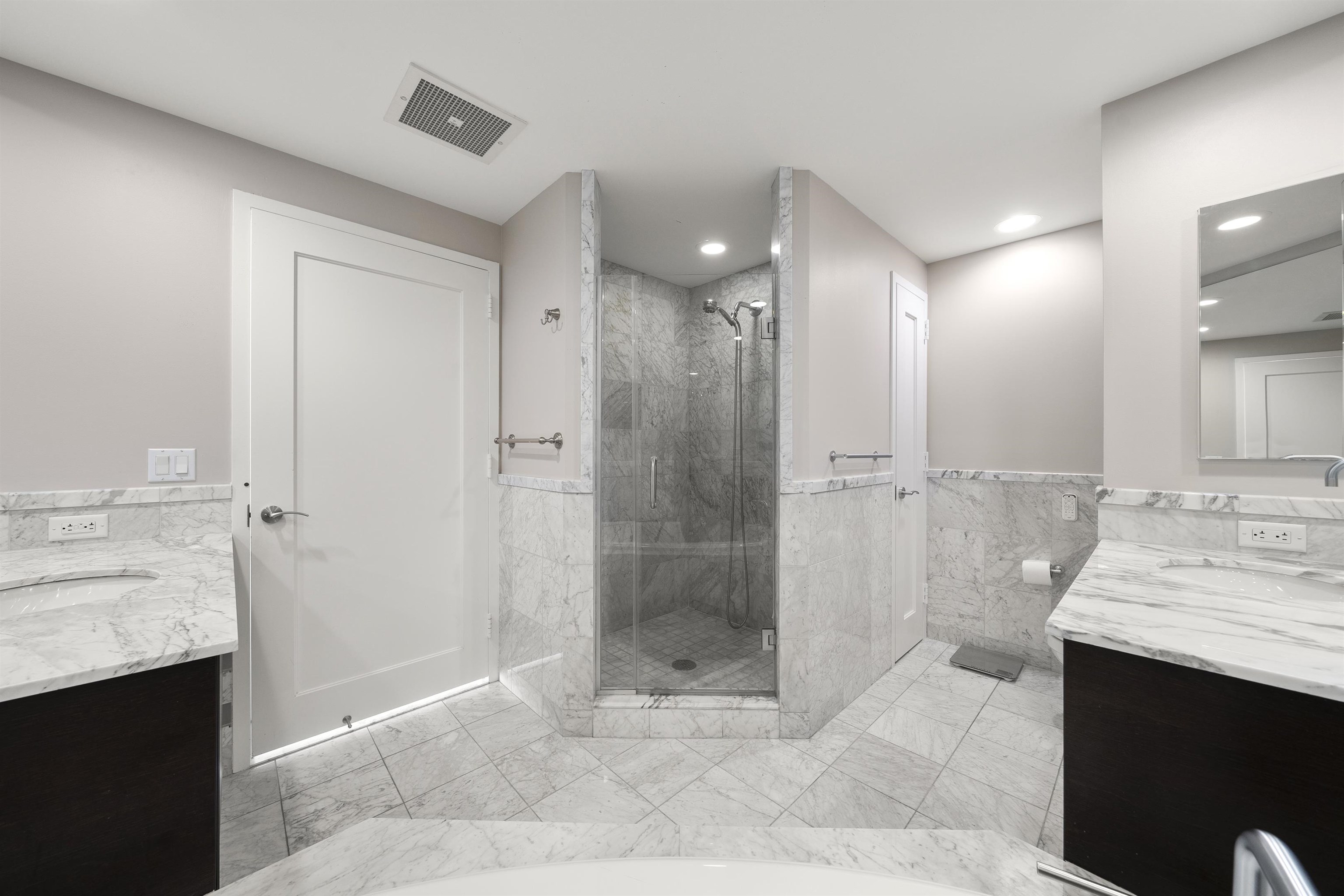 8100 River Road, Unit 1011 North Bergen, NJ 07047 - Photo 15 of 35 a bathroom with a shower sink and mirror