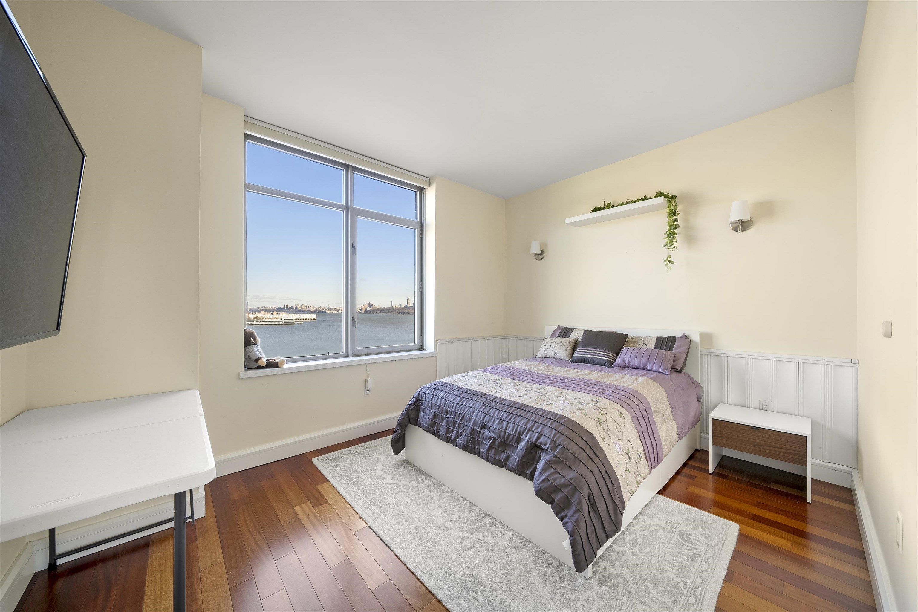 8100 River Road, Unit 1011 North Bergen, NJ 07047 - Photo 20 of 35 a bedroom with a bed and a window