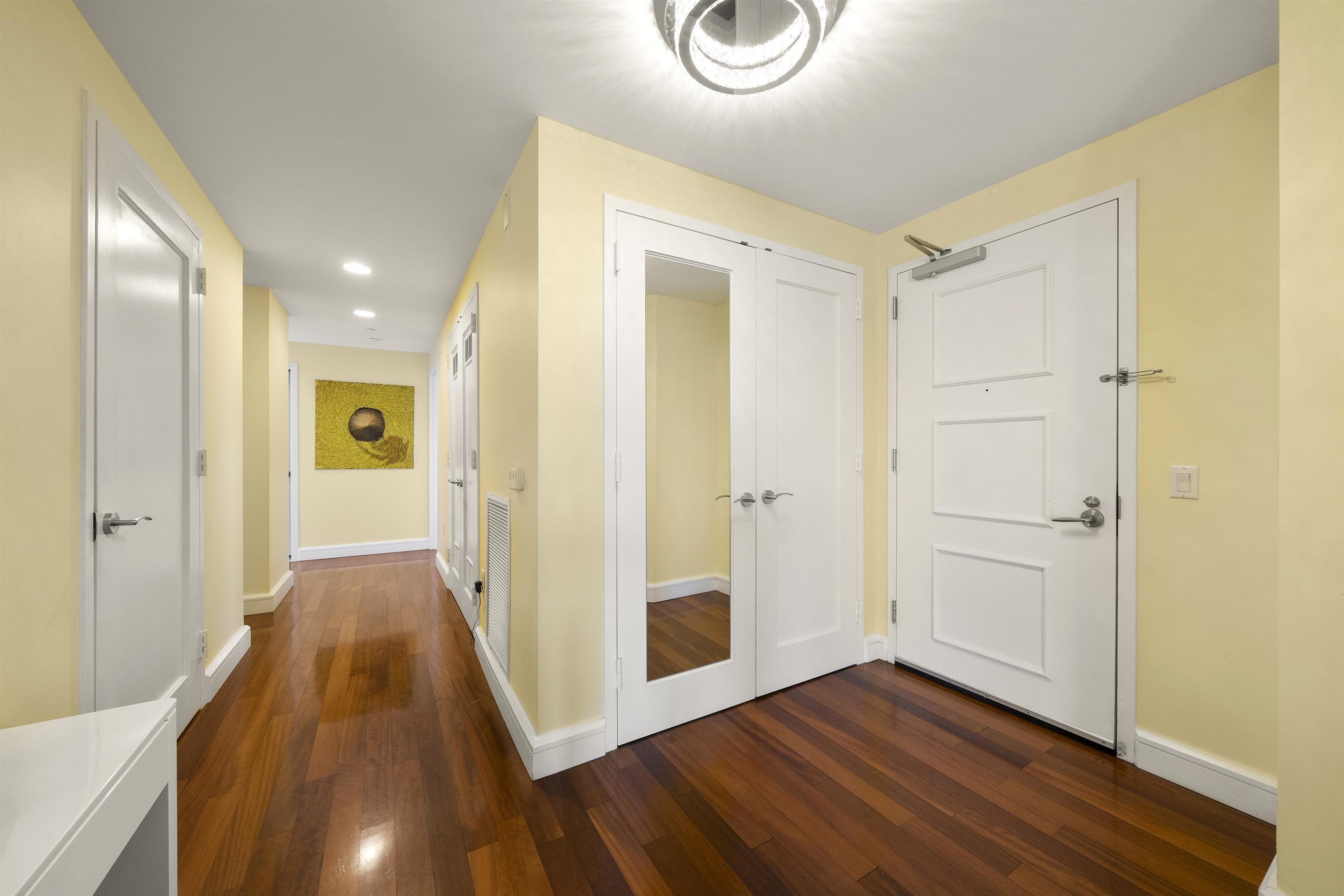 8100 River Road, Unit 1011 North Bergen, NJ 07047 - Photo 2 of 35 a view of a hallway with wooden floor