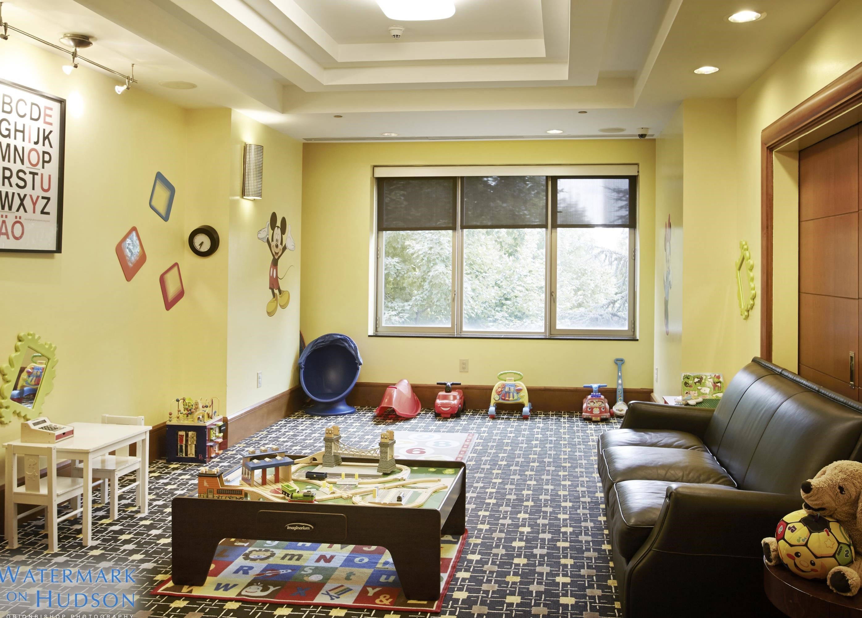 8100 River Road, Unit 1011 North Bergen, NJ 07047 - Photo 32 of 35 a living room with furniture and a fireplace