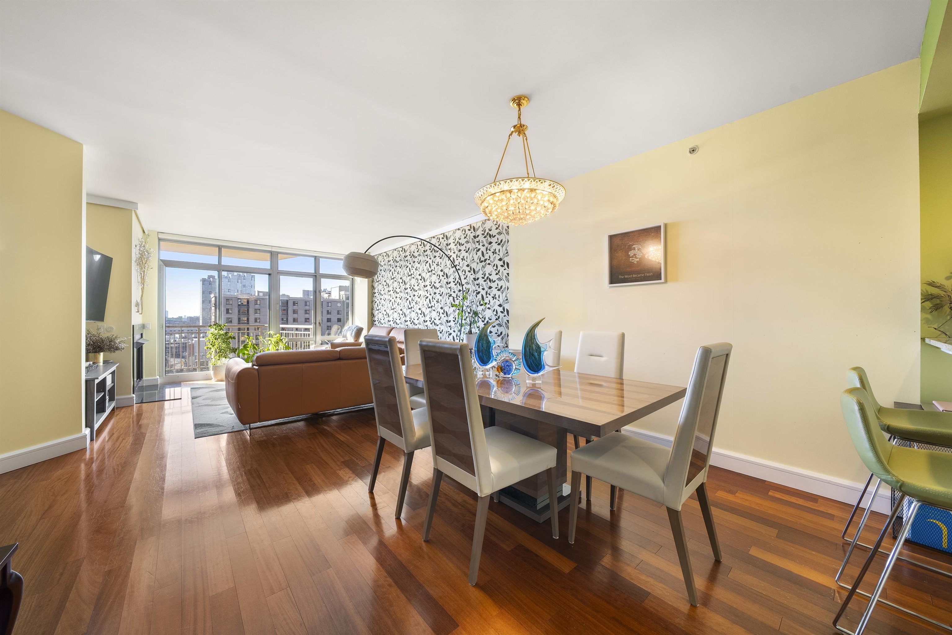 8100 River Road, Unit 1011 North Bergen, NJ 07047 - Photo 8 of 35 a view of a dining room with furniture window and wooden floor