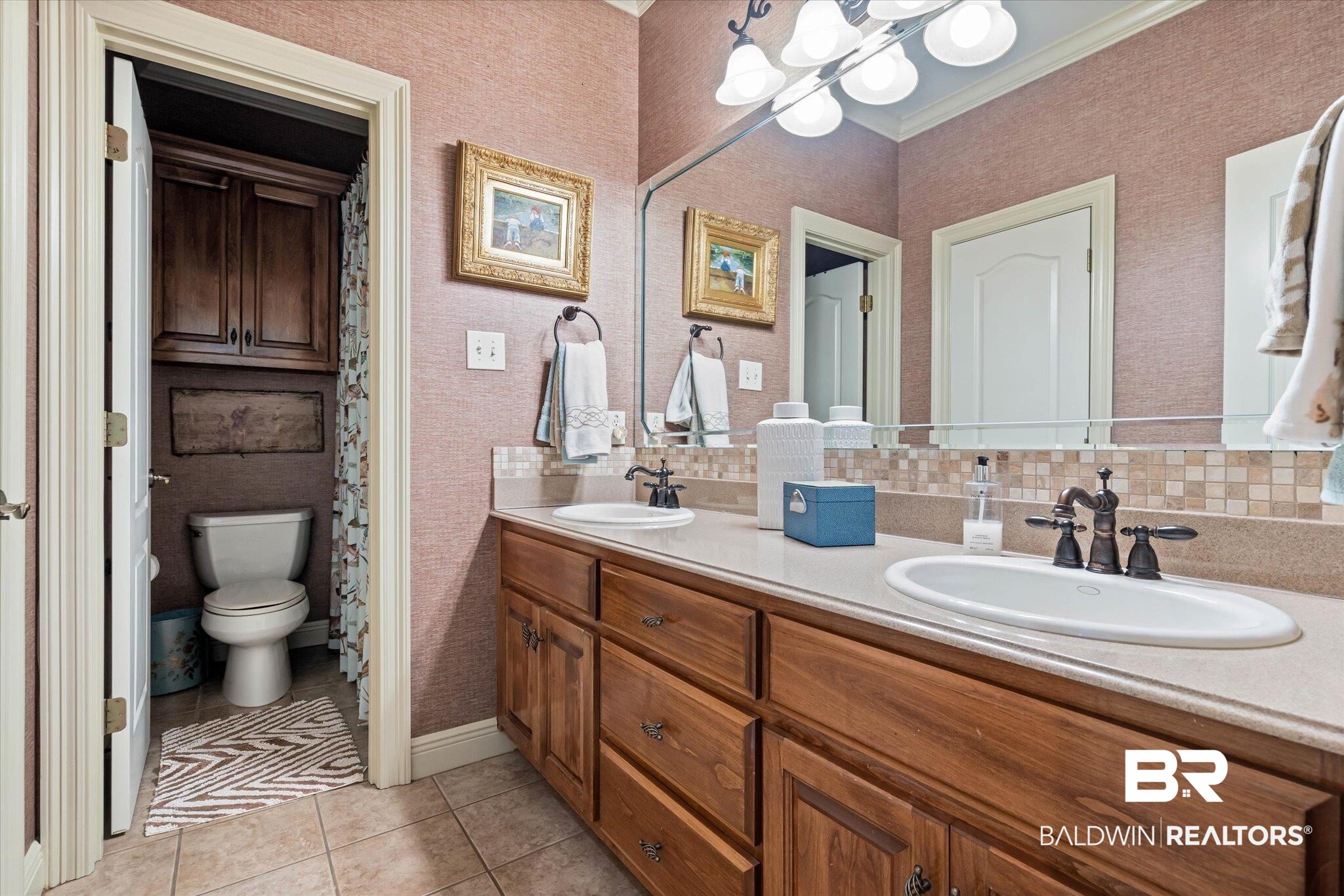 2905 Riverview Pointe Drive South Theodore, AL 36582 - Photo 22 of 44 Full bath with light tile patterned floors, double vanity, and wallpapered walls