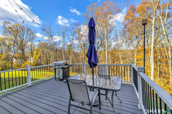 a view of a chairs on the roof deck