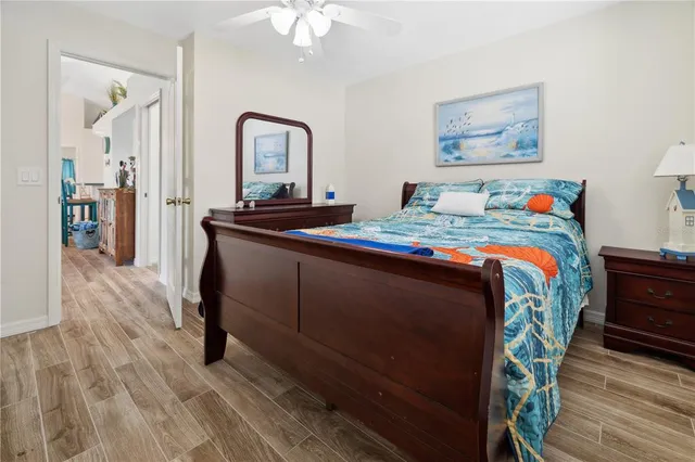 a bedroom with a bed and a dresser