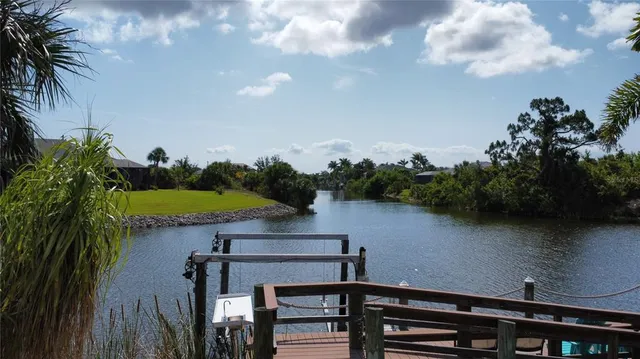 a view of a lake from a balcony