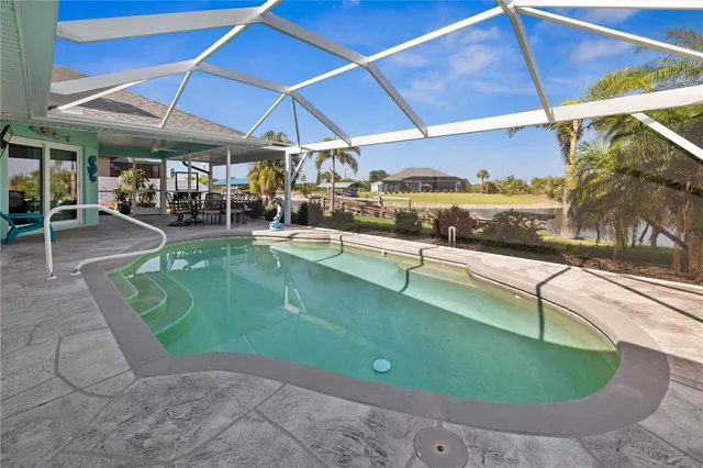 an outdoor view of a swimming pool