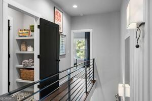 2328 Mason Drive Atlanta, GA 30316 - Photo 19 of 40 a view of a hallway with wooden floor and staircase