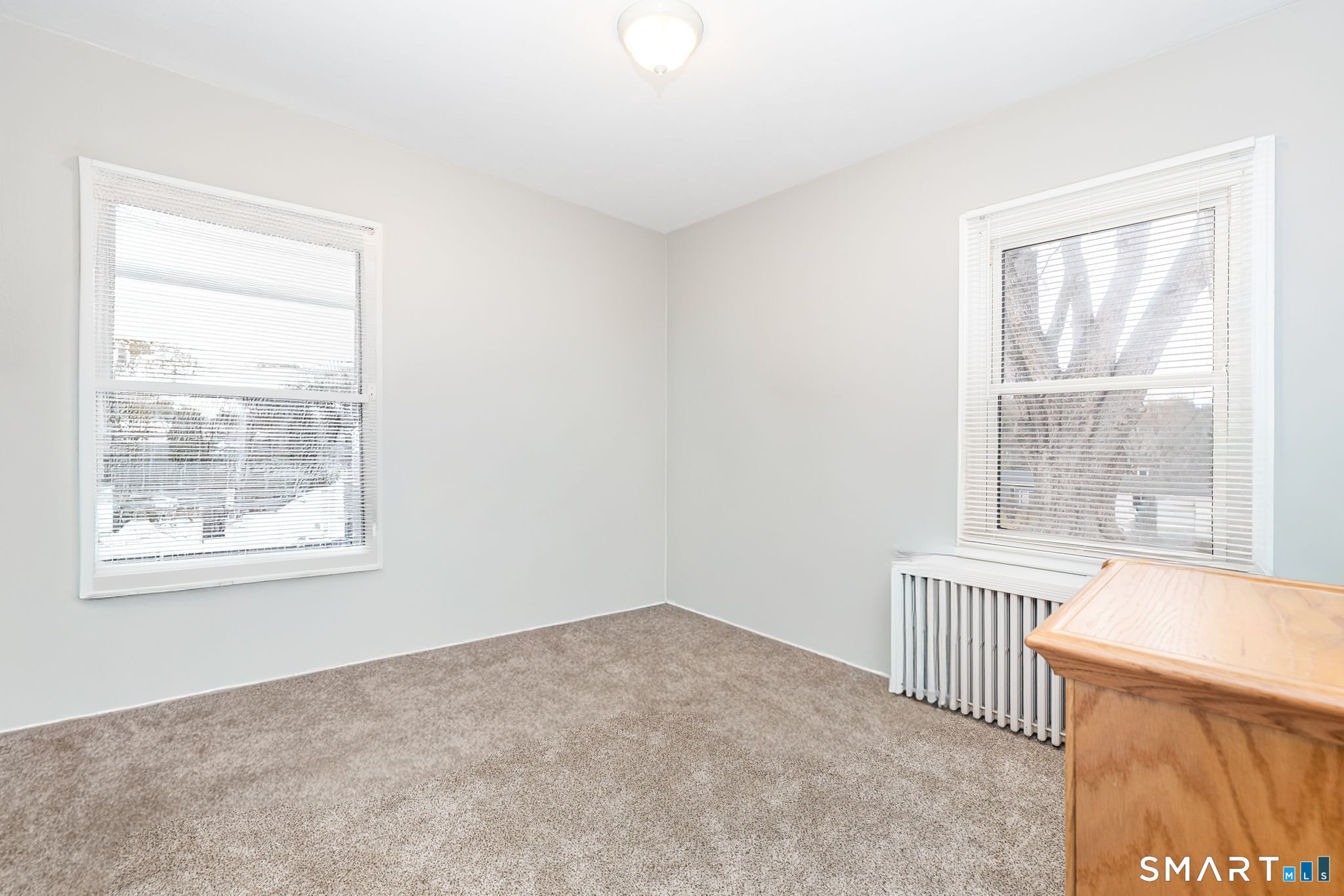 80 West Street Windsor Locks, CT 06096 - Photo 16 of 38 an empty room with a window