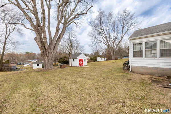 a house with trees in front of it