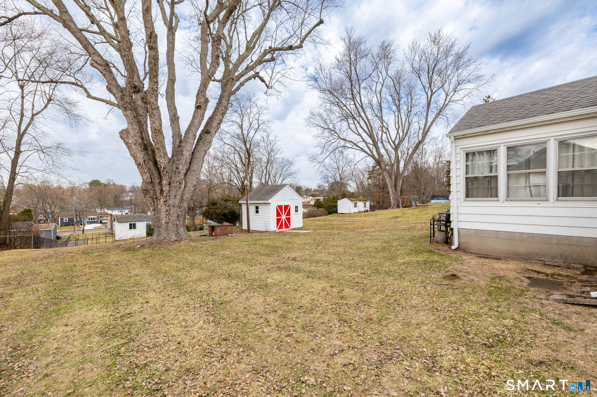 80 West Street Windsor Locks, CT 06096 - Photo 24 of 38 a house with trees in front of it