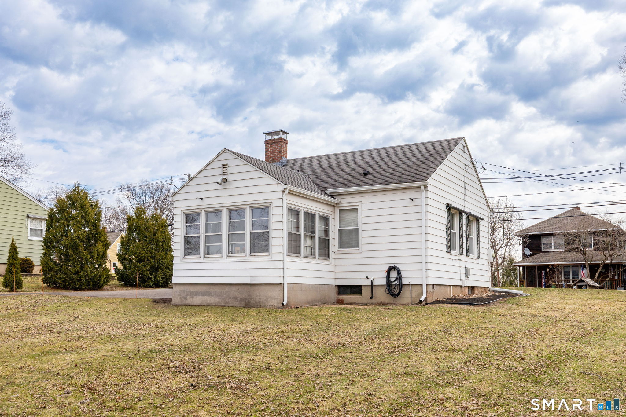 80 West Street Windsor Locks, CT 06096 - Photo 30 of 38 a front view of a house with a yard