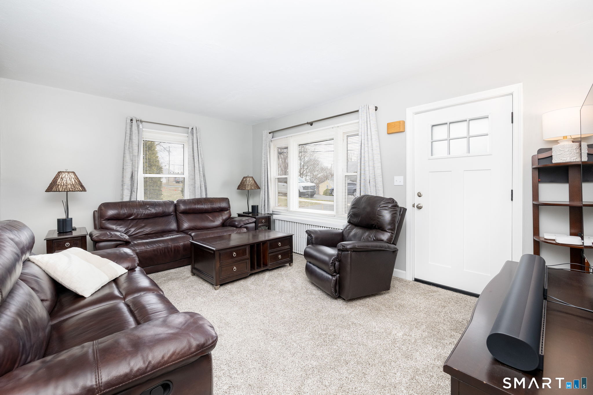 80 West Street Windsor Locks, CT 06096 - Photo 3 of 38 a living room with furniture and a window