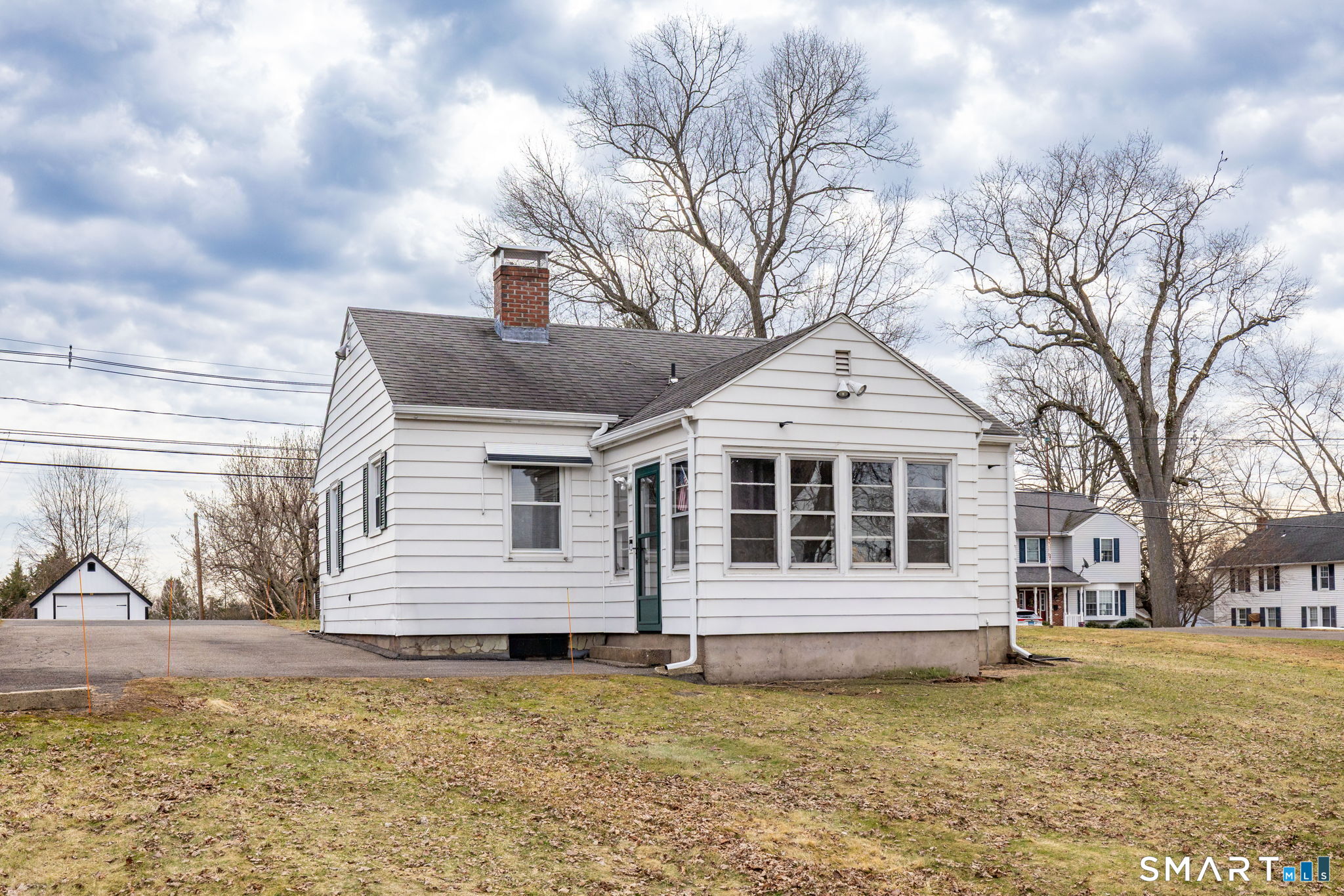 80 West Street Windsor Locks, CT 06096 - Photo 34 of 38 a front view of a house with a yard
