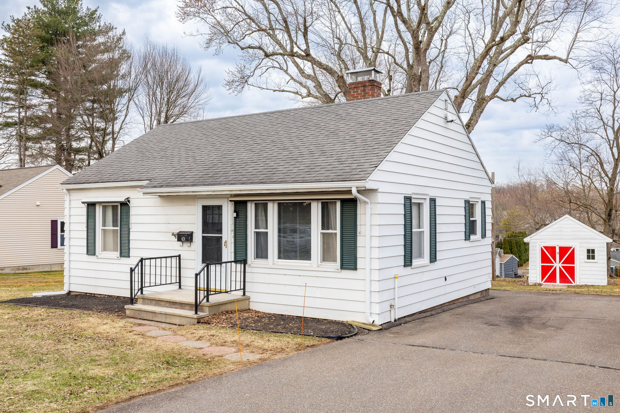 80 West Street Windsor Locks, CT 06096 - Photo 35 of 38 a view of a white house with a large tree