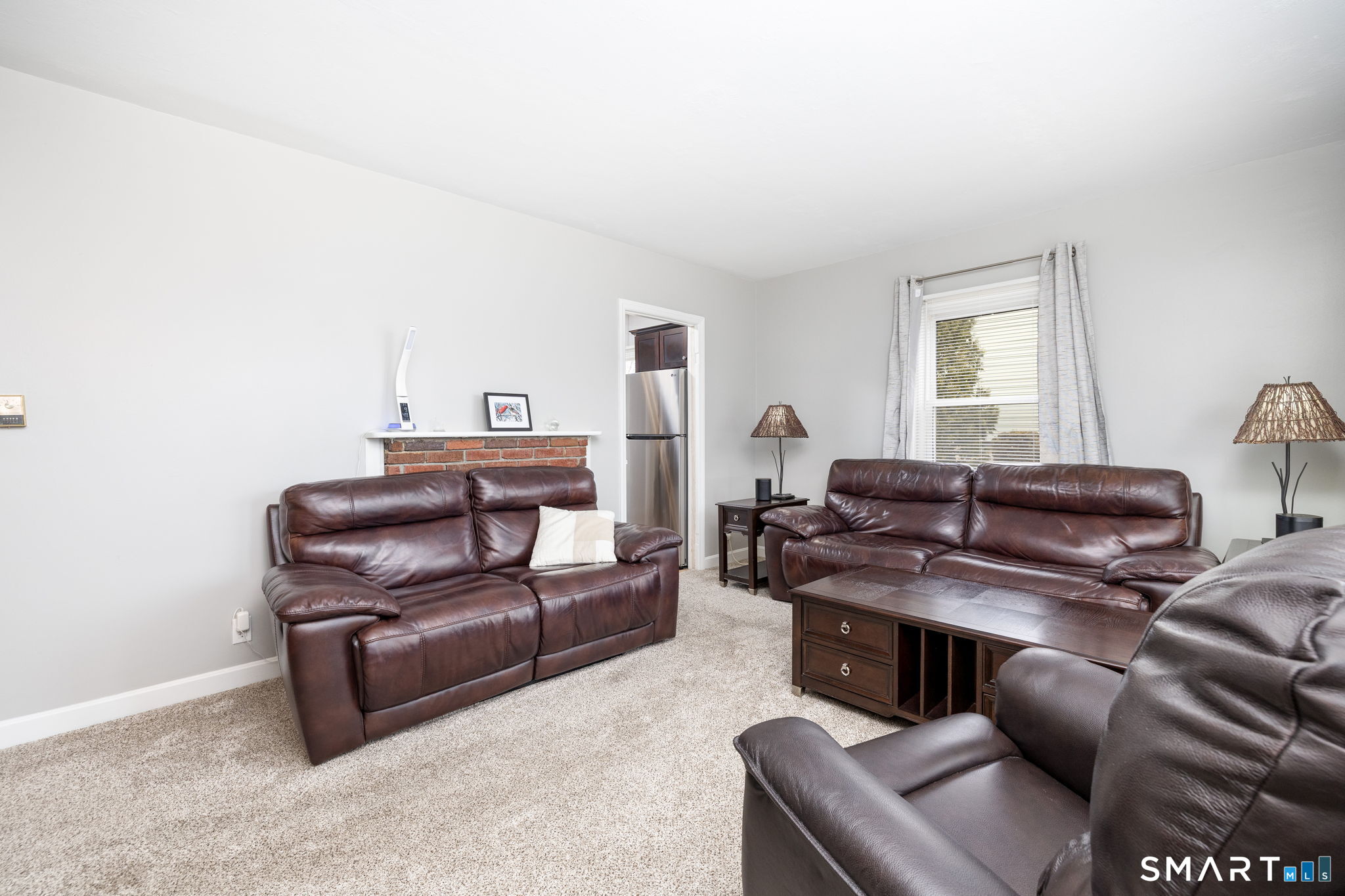 80 West Street Windsor Locks, CT 06096 - Photo 4 of 38 a living room with furniture and a window