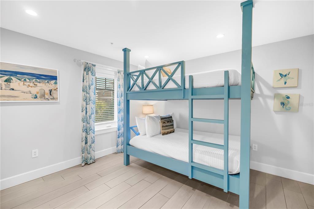 316 Beach Road Sarasota, FL 34242 - Photo 15 of 98 a bedroom with a bed and a window