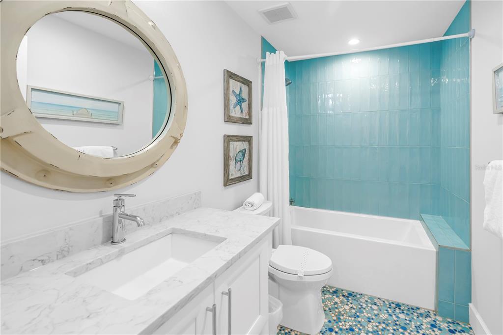 316 Beach Road Sarasota, FL 34242 - Photo 21 of 98 a bathroom with a sink a toilet and shower