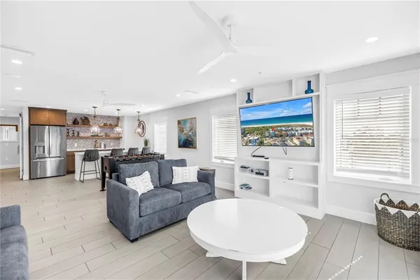 a kitchen with a stove a sink and a refrigerator