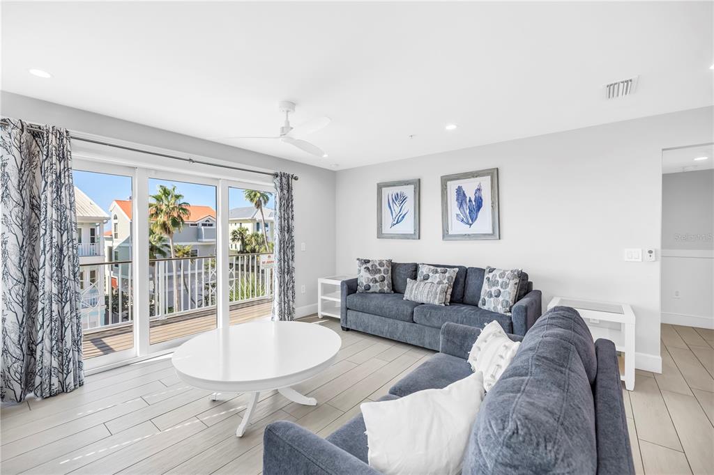 316 Beach Road Sarasota, FL 34242 - Photo 47 of 98 a living room with furniture and a large window