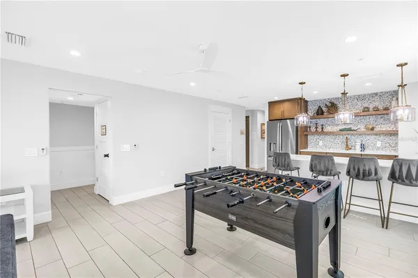 a view of a dining room with furniture window and outside view