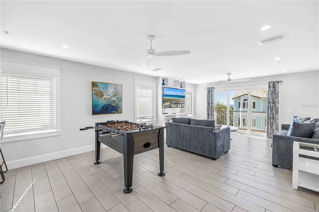 316 Beach Road Sarasota, FL 34242 - Photo 51 of 98 a living room with furniture and a window