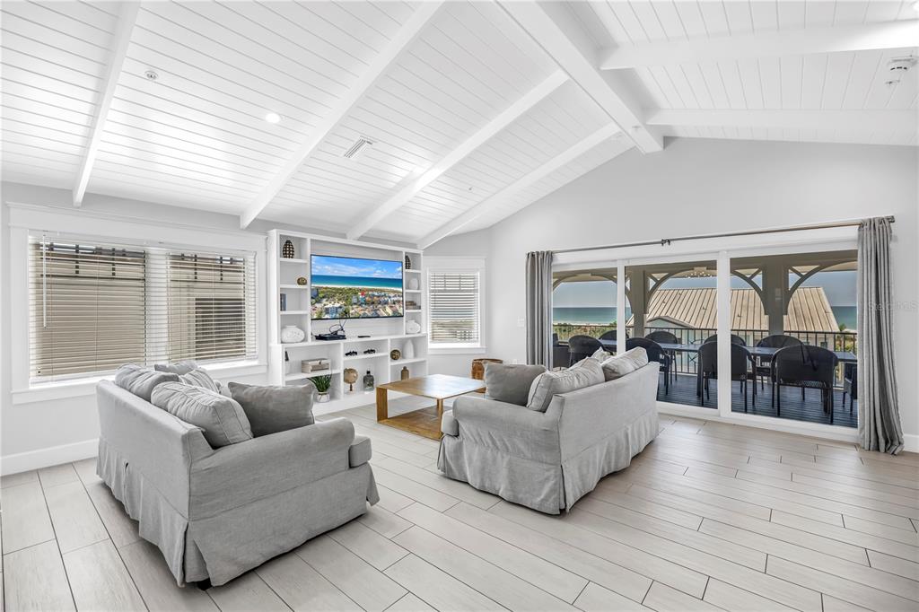 316 Beach Road Sarasota, FL 34242 - Photo 72 of 98 a living room with furniture and large windows